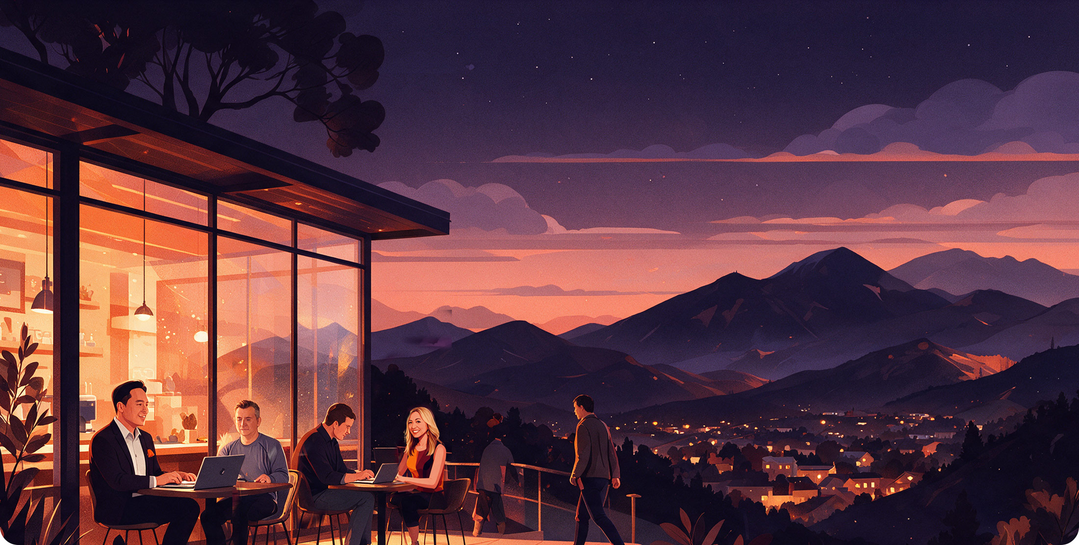 The Codeblaze team working on laptops on a terrace overlooking mountains at dusk